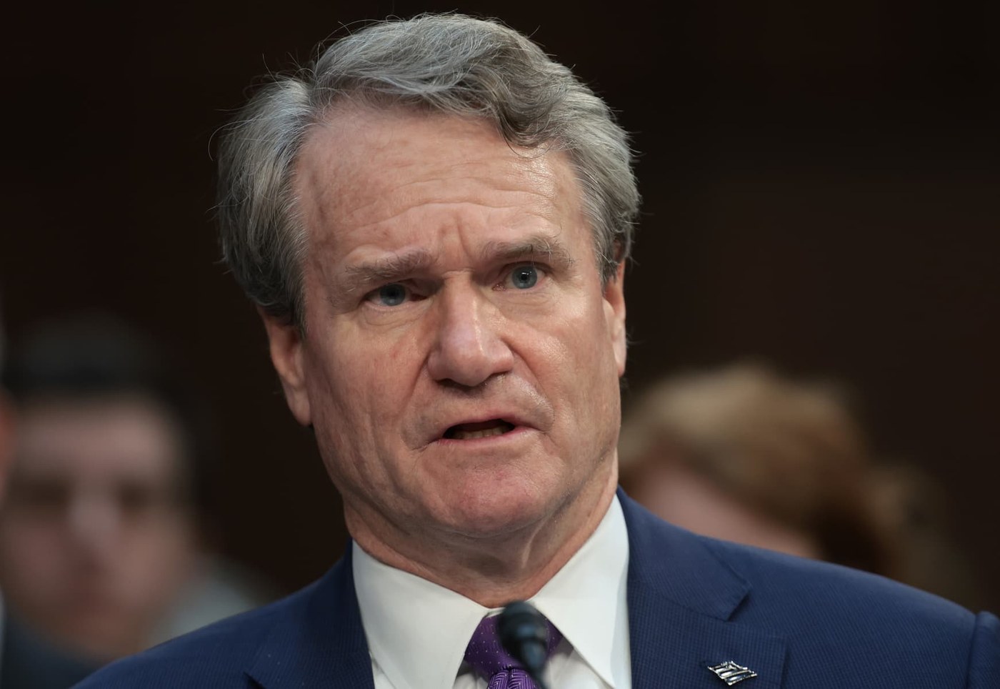 Bank of America expects third-quarter investment banking fees to fall more than 10%; shares slide
